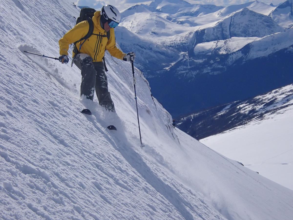 Skier on steep powder slope in the Chilean Andes